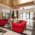 Hotel Royal Baltic 4 Luxury Boutique in Ustka lobby with red sofas and black-and-white checkered floor