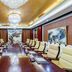 Liuhu Hotel (Hot Spring Garden Hotel) in Dezhou boardroom with long conference table and leather chairs