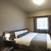 Dormy Inn Premium Hakata Canal City Mae Natural Hot Spring guest room in Fukuoka with double bed and TV