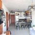 Apart Hotel Brisas do Amor, Pipa: modern apartment living area with TV, dining table and sofa