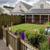Hillhead Farm Lets in Stirling with a garden, lawn, fenced yard and a small outdoor tank beside the building.
