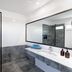 Dream Bocayna Village in Yaiza: modern bathroom with walk-in shower, double vanity and large mirror
