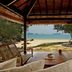 Koyao Island Resort in Ko Yao Noi with a beachfront pavilion opening to a tropical beach and sea view