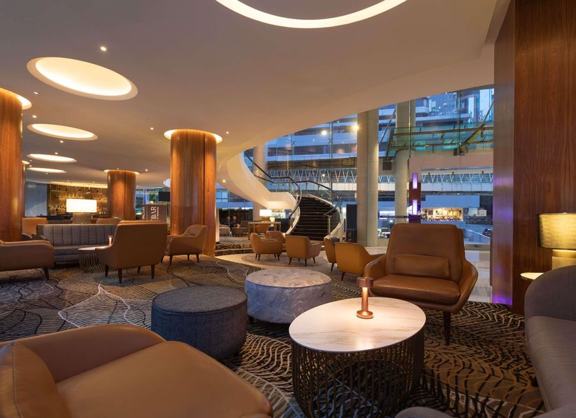 Novotel Kuala Lumpur City Centre lobby lounge with modern seating and city views in Kuala Lumpur