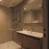 Hôtel Parc Adélie - Logis Hôtels bathroom with glass shower, vanity sink and mirror in Montagny-lès-Beaune