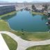 Longstreet Inn & Casino in Amargosa Valley with a pond, gazebo, and landscaped lawn