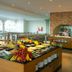 Ukino Palmeiras Village buffet restaurant in Porches with fruit display and serving counters