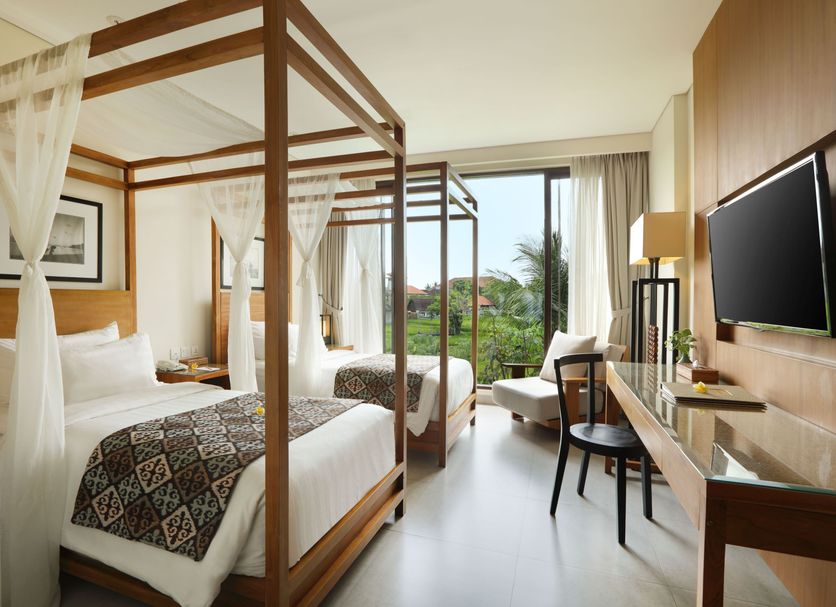 Plataran Ubud Hotel And Spa room with four-poster beds and garden view in Denpasar