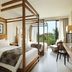 Plataran Ubud Hotel And Spa room with four-poster beds and garden view in Denpasar