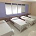 Hotel Dez De Julho in Manaus: simple guest room with four single beds, tiled floor and window blinds