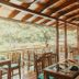 El Rodeo Estancia Boutique Hotel & Steakhouse in San Antonio outdoor restaurant terrace with wooden seating