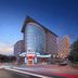Xiamen Harbor Bay Hotel (Zhongshan Road First Wharf Store) in Xiamen at dusk with curved glass facade and city lights