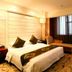 Yangling International Conference & Exhibition Center Hotel room in Xianyang with king bed, chaise lounge and window view
