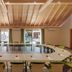 Pfalzhotel Asselheim meeting room in Gruenstadt with U-shaped tables and wood-beamed ceiling