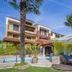 Apartments with Pool Villa Rossella 1 in Rovinj, poolside loungers and palm trees by the building