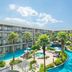 Le Méridien Khao Lak Resort & Spa in Khao Lak with lagoon-style pool and palm trees