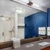 Fairfield Inn & Suites by Marriott Brunswick Freeport bathroom with vanity and blue accent wall