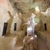Park Hotel Tyrrenian in Amantea: cave-like spa room with illuminated statue and stone benches