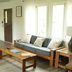 Denali RV Park and Motel in Healy living room with sofa, coffee table and bright windows