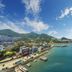 Onda D'oro Hostel in Yeosu with coastal harbor views, beach, boats, and mountains