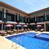 Seashell Resort Krabi in Krabi: courtyard pool with sun loungers and umbrellas