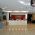 Jb City Hotel lobby in Johor Bahru with front desk and seating area
