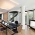 Living Hotel Prinzessin Elisabeth Munich: modern suite with spiral staircase, dining table, and balcony windows