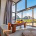 Secret Courtyard Resort Hotel Guilin room with floor-to-ceiling windows and mountain views