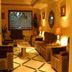 Hotel IK London Residency Hyderabad lobby lounge with sofas, lamps, and patterned tile floor