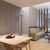 The Central Kirchberg - Smart Aparthotel, Luxembourg living area with sofa, armchairs, table and curtains