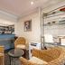 Twin Towers Inn, Artarmon lounge area with wicker chairs, glass tables and a bar