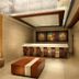 Mahagun Sarovar Portico Suites Ghaziabad lobby with modern reception desk and chandelier