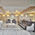 The Garden Hotel & Resort in Fort Lauderdale lobby with tufted sofas and coffee table
