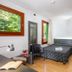 Hotel La Pergola in Lignano Sabbiadoro guest room with single bed, desk, chair and wood floor