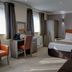 Best Western Manchester Bury Bolholt Country Park Hotel room in Bury with double bed, desk, and sofa