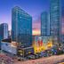 The Longemont Shenyang hotel skyline view at dusk in Shenyang, with modern high-rise towers