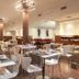 Dazzler by Wyndham Buenos Aires Maipu restaurant with tables and white chairs in Buenos Aires