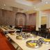 Hotel Naivedya, Aurangabad dining room with buffet tables and covered serving dishes