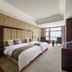 Xinhua Jianguo Hotel Jiujiang room with twin beds and lake view balcony