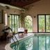 Montebelli Agriturismo & Country Hotel indoor pool with garden views in Grosseto