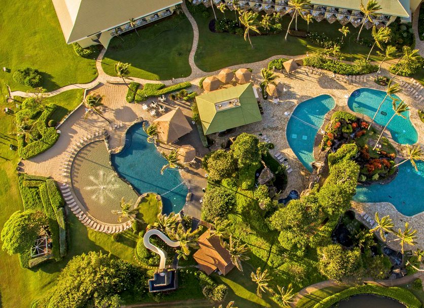 Outrigger Kaua'i Beach Resort & Spa in Lihue with lagoon-style pools and tropical landscaping