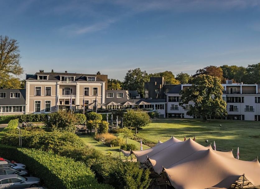 Landgoed Lauswolt in Beetsterzwaag with manicured gardens and a large event tent on the lawn