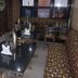 Hotel Trishul Haridwar restaurant seating with tables and patterned bench in Haridwar