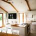 The Anchorage & The Tackleshed in Barry, bright self-catering kitchen with lounge and patio doors