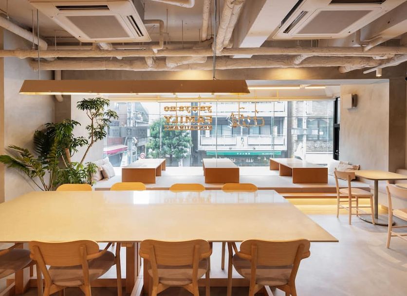 the b sangenjaya Tokyo dining area with large windows and city street view