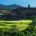 St. Eugene Golf Resort & Casino in Cranbrook with golf course, resort buildings, and mountain views