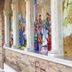 Ristorante Hotel Lucia in Giulianova, arched brick corridor with colorful religious mosaic panels