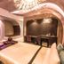 Voga Motel in Taichung City, modern room with king bed, lounge chairs and wall-mounted TV