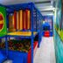 Hotel Plaza Camboriú indoor kids' play area with ball pit and colorful climbing structures in Balneário Camboriú