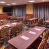Hampton Inn & Suites Ontario meeting room with tables and chairs set for a conference